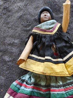 Vintage handmade doll in traditional dress